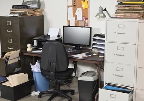 a messy desk that's not mine