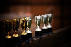 a row of several trophies