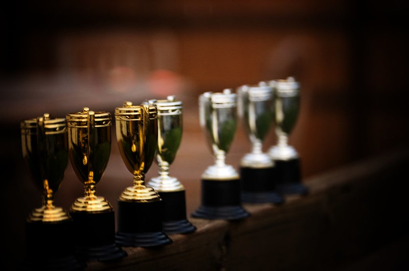 a row of several trophies