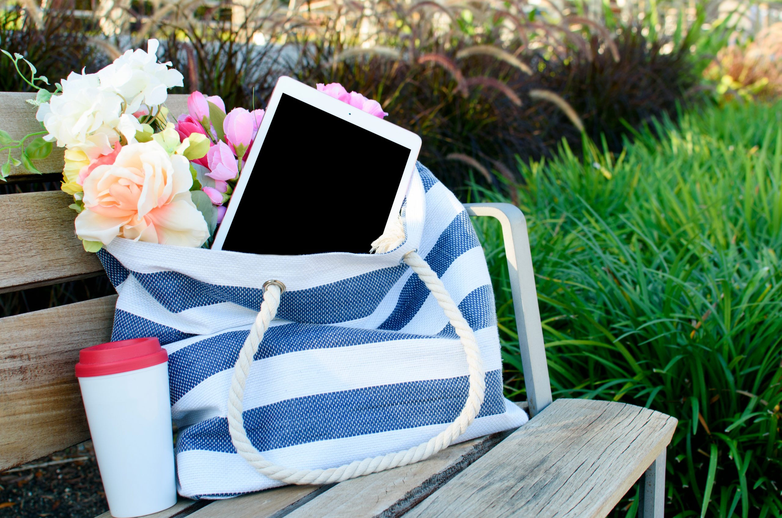 Canva - White Ipad With Black Screen in Tote Bag