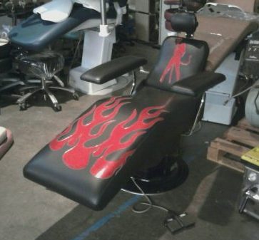 a rad black chair with some sweet flames on it
