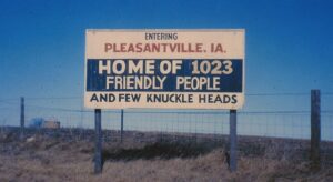 1963 road sign for Pleasantville, IA