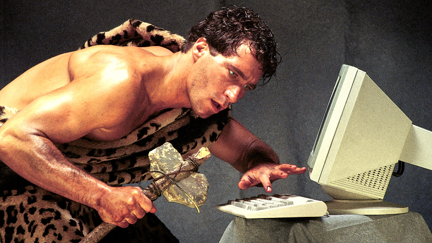Caveman at computer