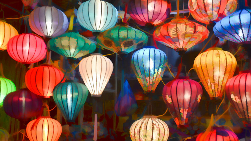 Bright, colorful Vietnamese wish lanterns hang from the ceiling.